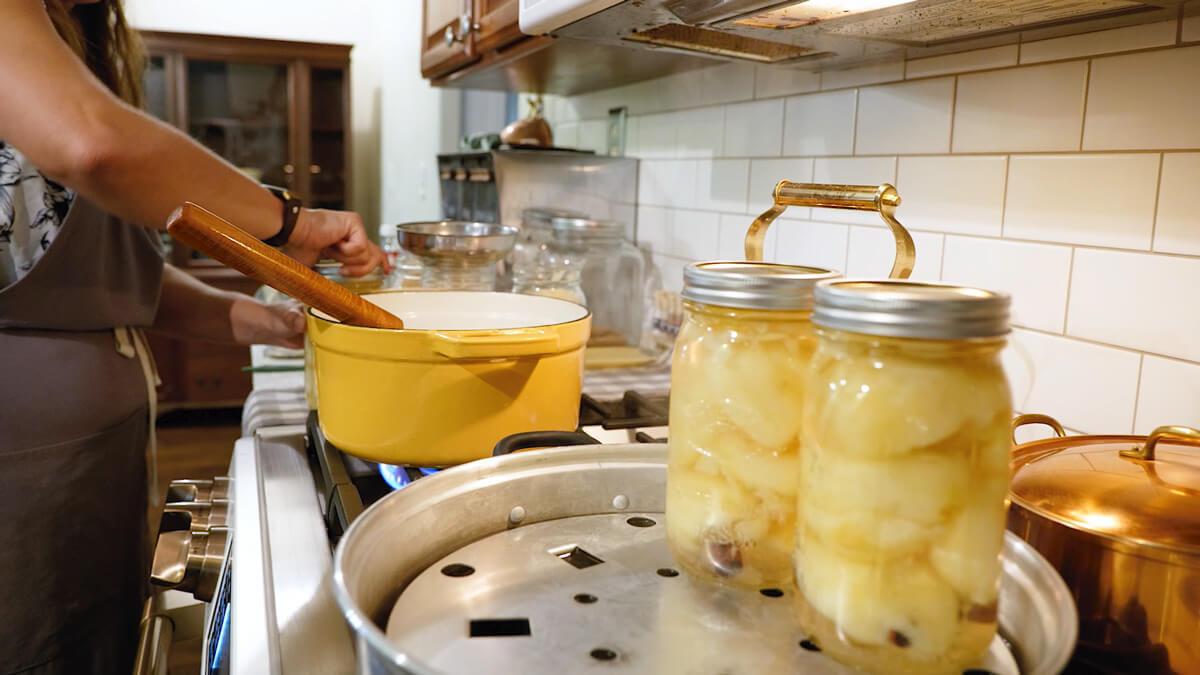 Jars of canned pears in a steam canner.