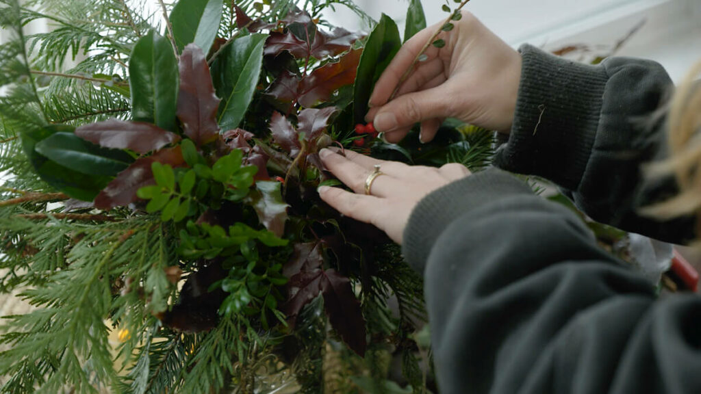 A close up shot of an evergreen bouquet.