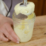 Homemade mayonnaise in a jar.