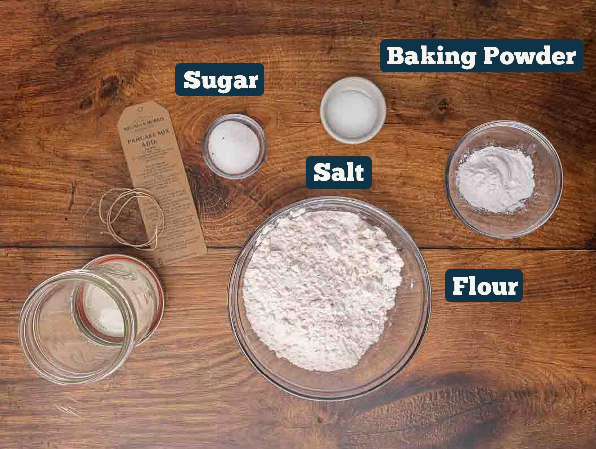 Homemade pancake mix recipe ingredients: flour, salt, baking powder, and sugar.