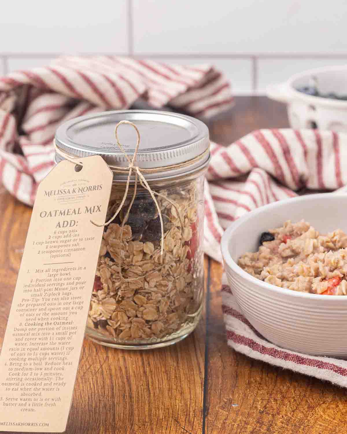 A jar of instant oatmeal mix sitting next to a bowl of prepared oatmeal.
