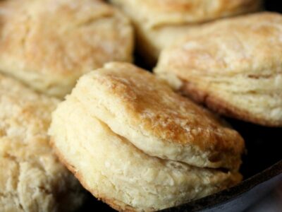 Buttermilk biscuits in a cast iron pan.