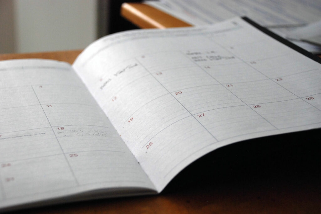 Image of a blank calendar laid out on a table.