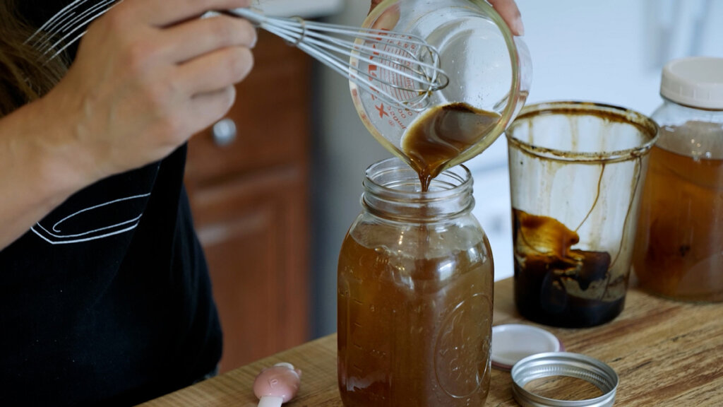 Homemade switchel in a half gallon Mason jar.