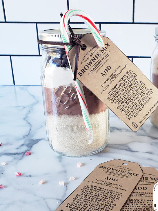 Pinterest pin for DIY Brownie Mix in a mason jar, with photos of brownie mix in a mason jar.