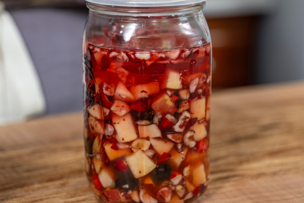 Upclose shot of a jar of fermented cranberry sauce.