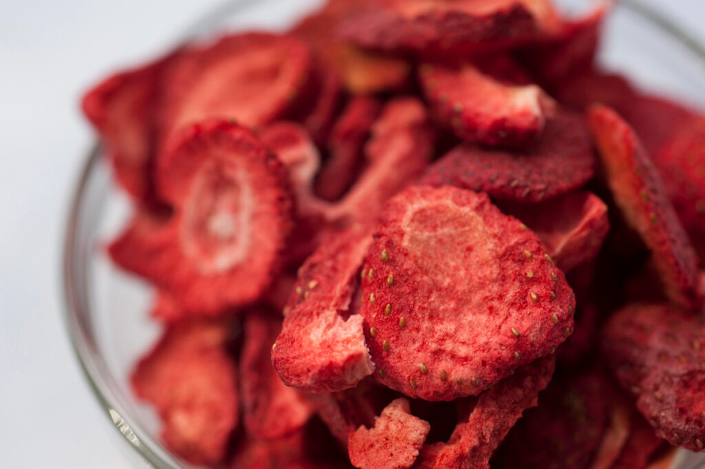 Freeze dried strawberries in a glass bowl.