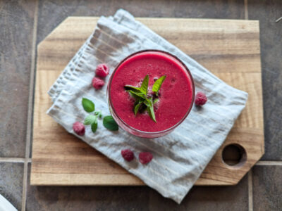 Fresh raspberry juice in a glass.