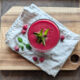 Fresh raspberry juice in a glass.