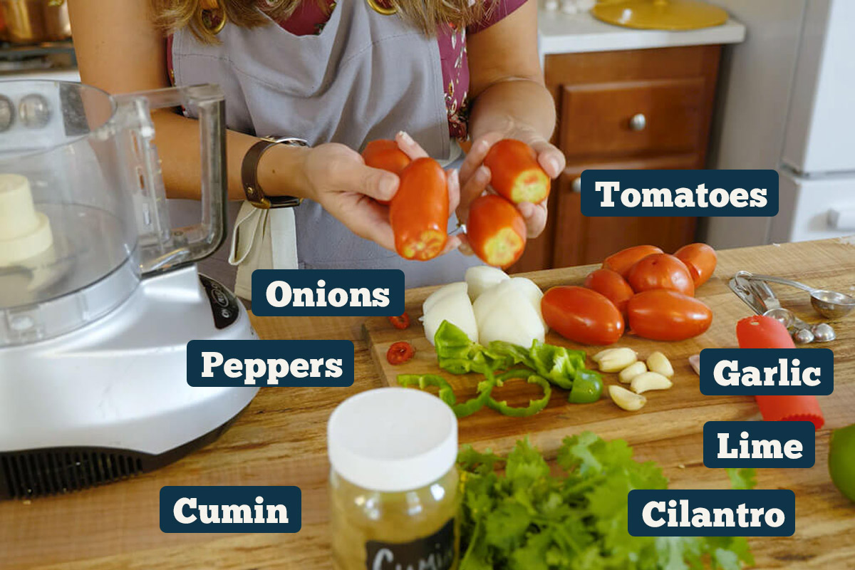 Fermented salsa ingredients: onions, tomatoes, peppers, garlic, cumin and cilantro.