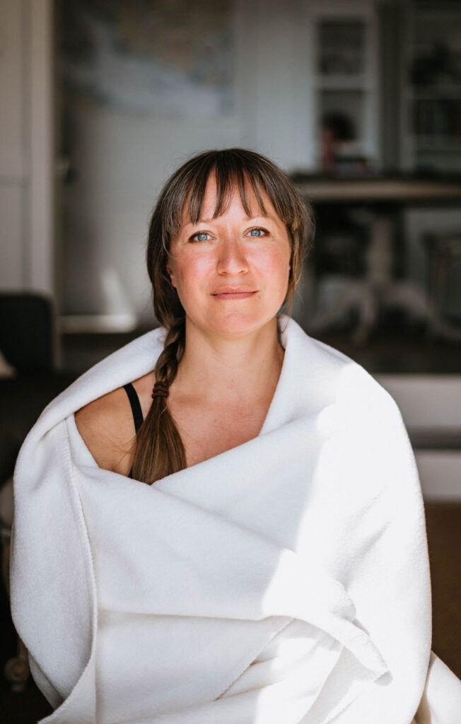 A woman in a white shirt.