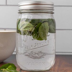 A jar filled with mint extract.