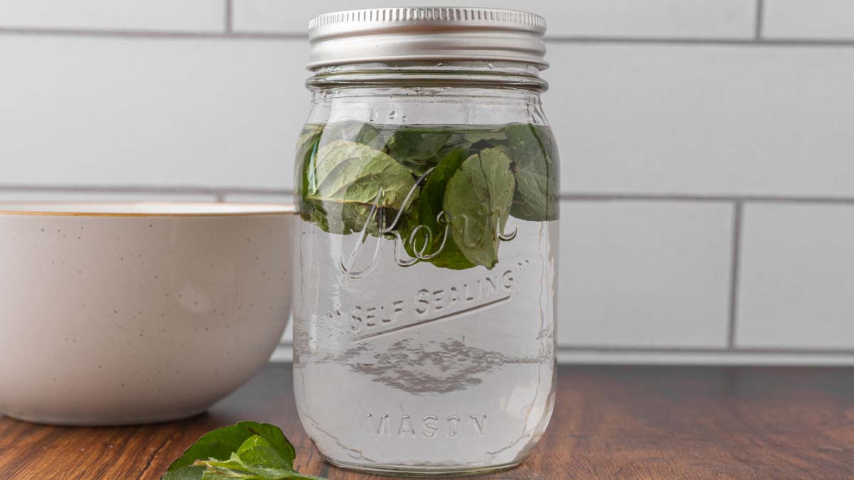 A jar filled with mint extract.