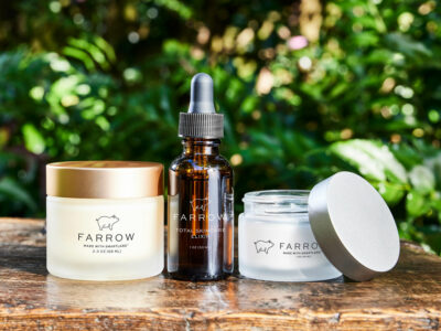 Farrow Skincare products on a wooden surface.