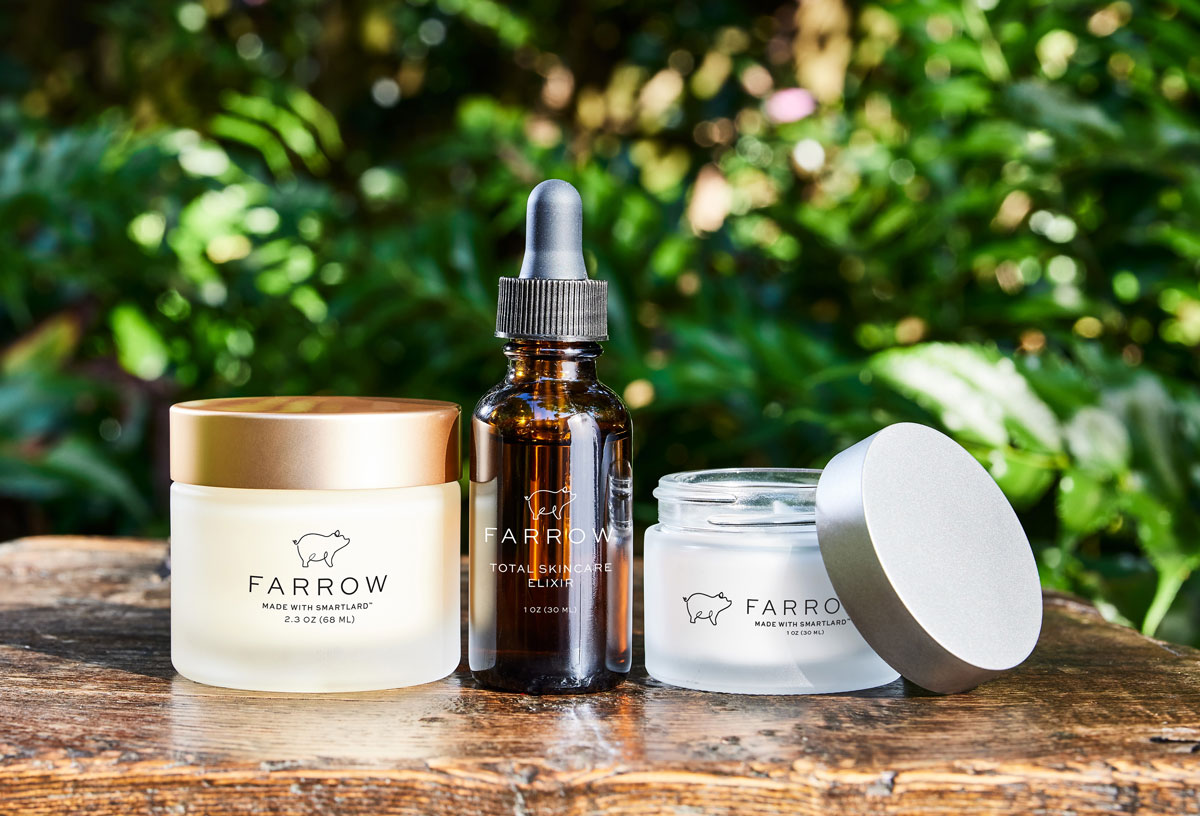 Farrow Skincare products on a wooden surface.