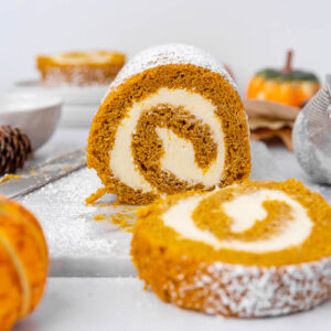 Pumpkin roll sliced on the counter.