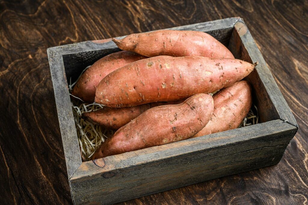 A box of sweet potatoes.