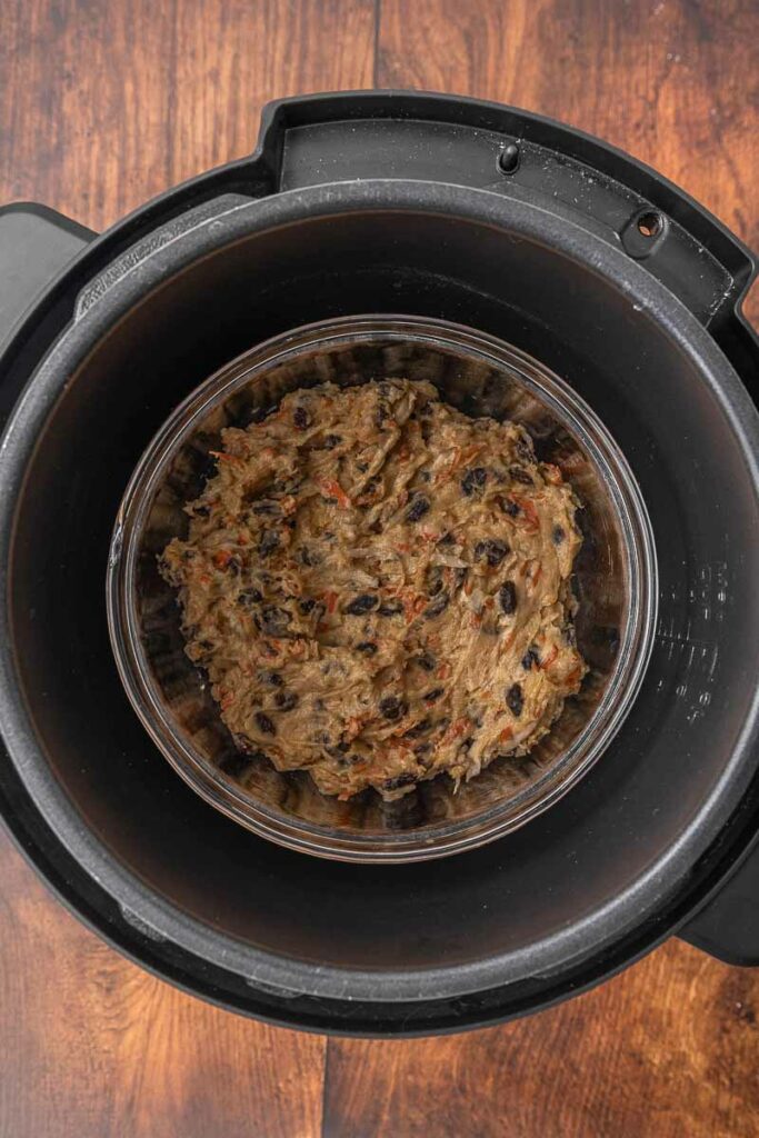 Christmas pudding batter in a bowl in the Instant Pot.