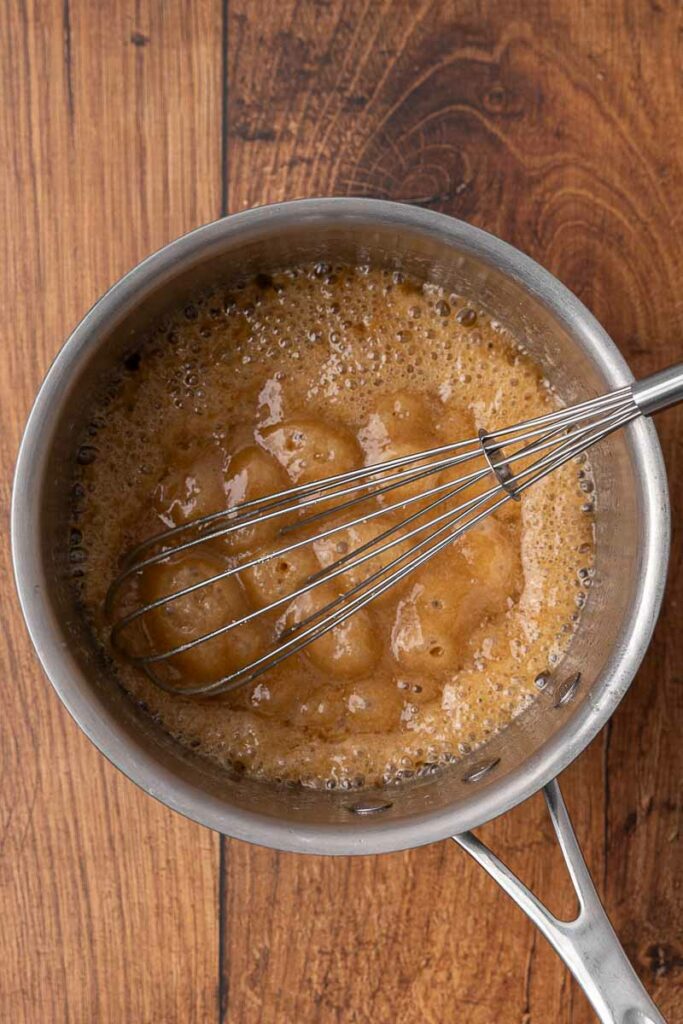 Brown sugar sauce cooking in a pot.