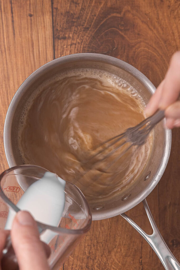 Brown sugar sauce cooking in a pot.