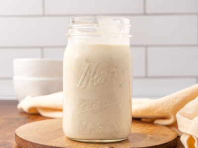 A Mason jar with cream of chicken soup in it.