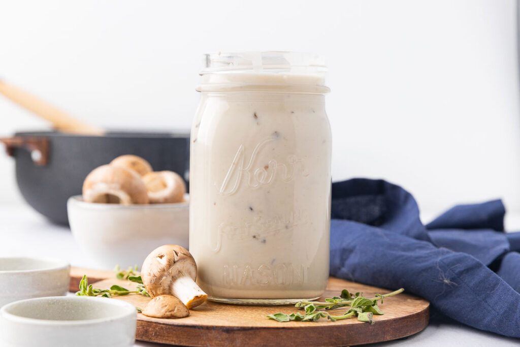 Cream of mushroom soup in a Mason jar.