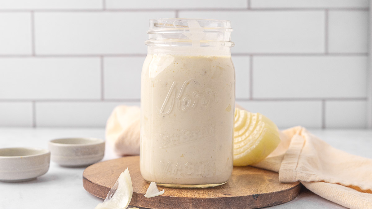 Cream of onion soup in a Mason jar.