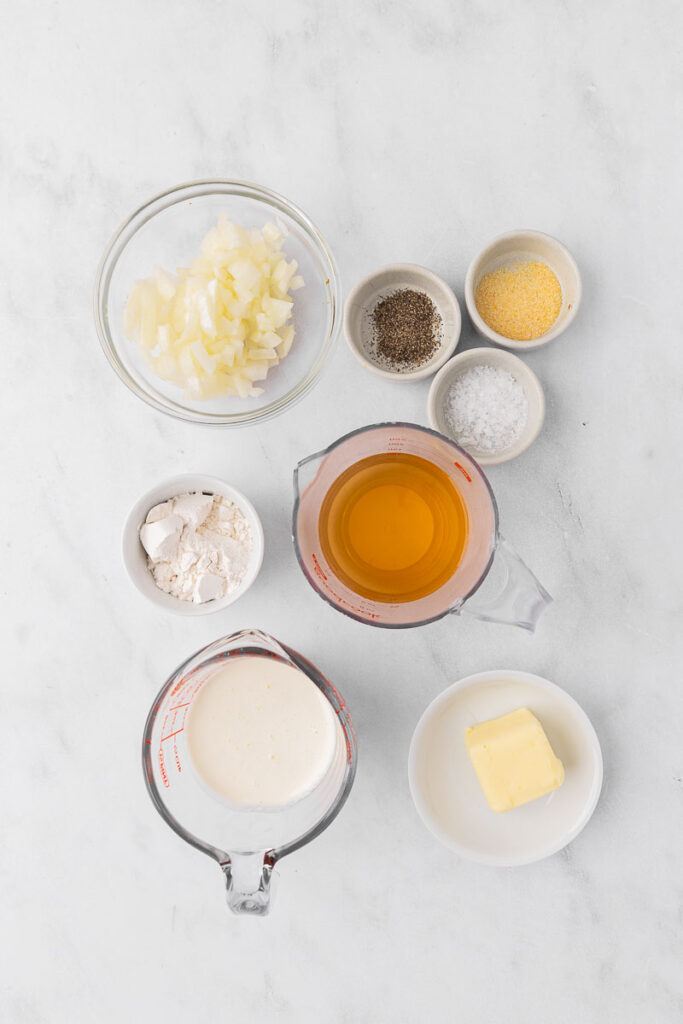 Cream of onion soup ingredients in bowls.