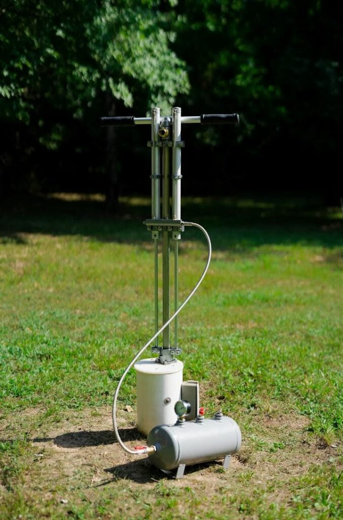 A hand pump water pump for a well.