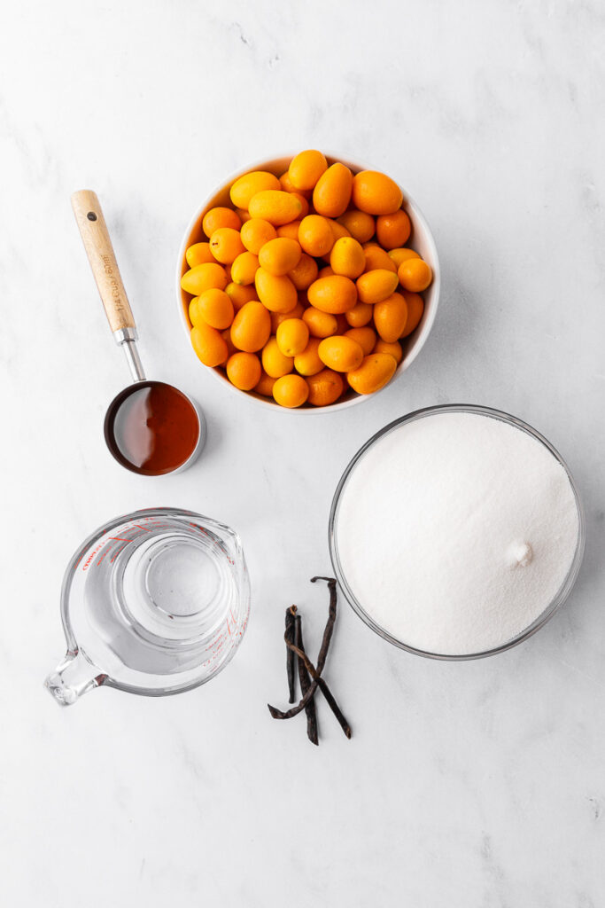 Ingredients for making candied kumquats.