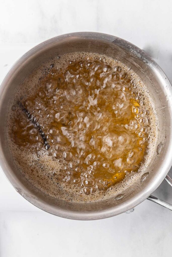 Boiling syrup for making candied kumquats.