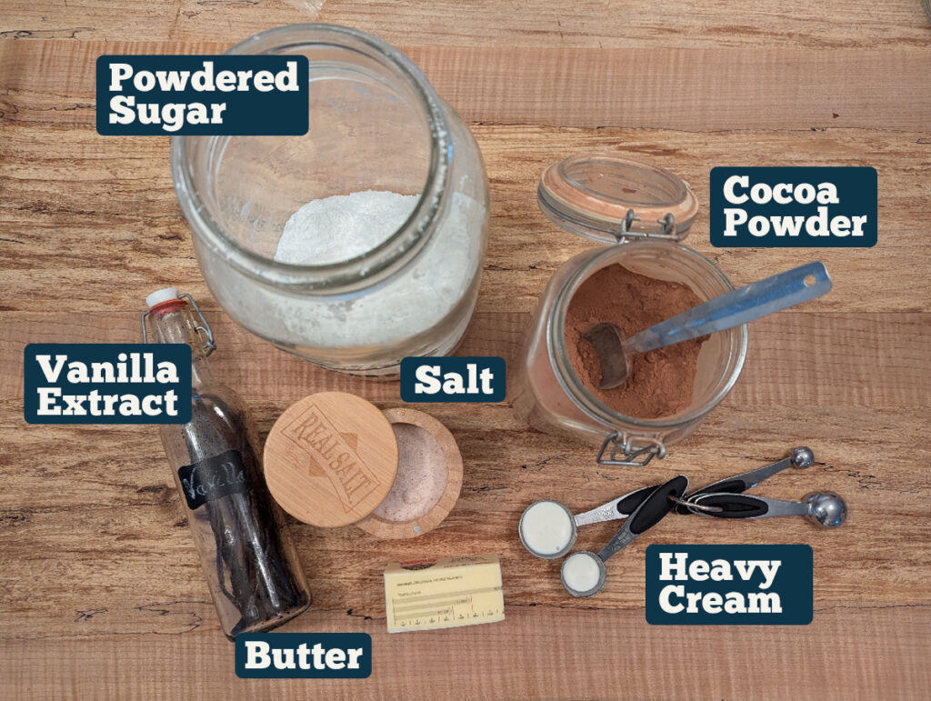 Ingredients for chocolate buttercream frosting on a counter.