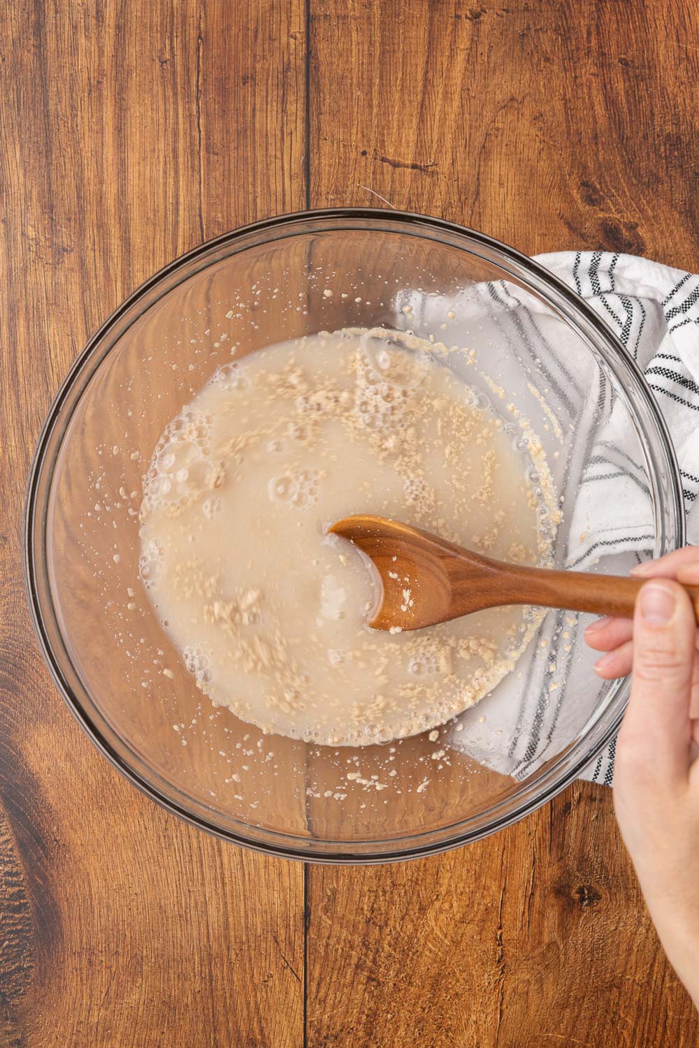 Ingredients for homemade no rise dinner rolls in a glass bowl.