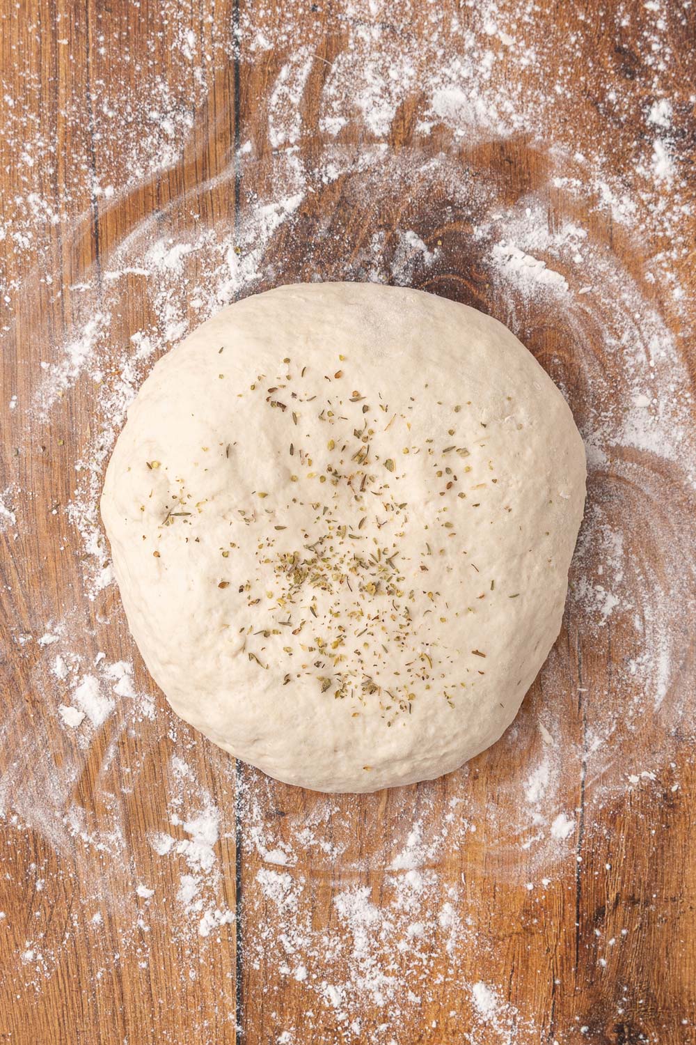 Herbs mixed into the dough of dinner rolls.