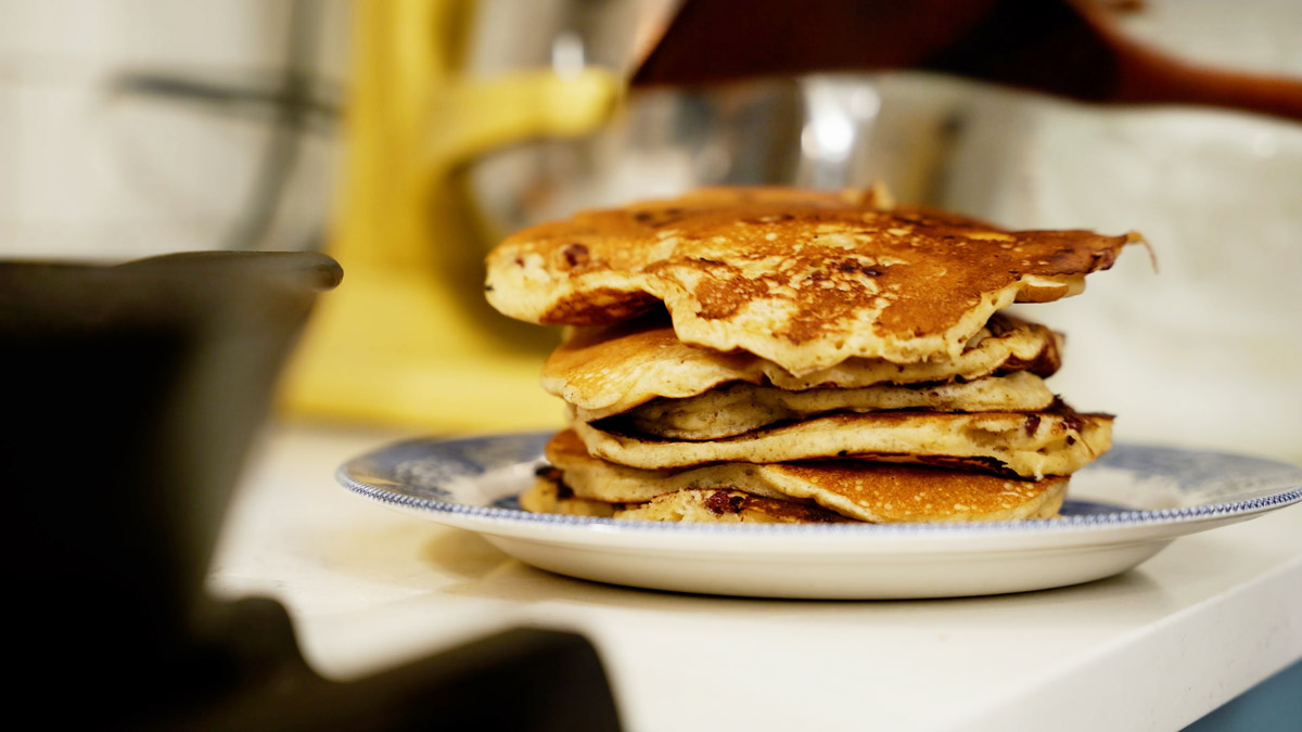 A stack of cooked sourdough pancakes.