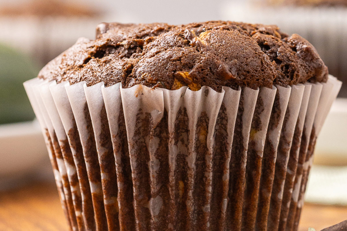 Close up shot of a double chocolate zucchini muffin.