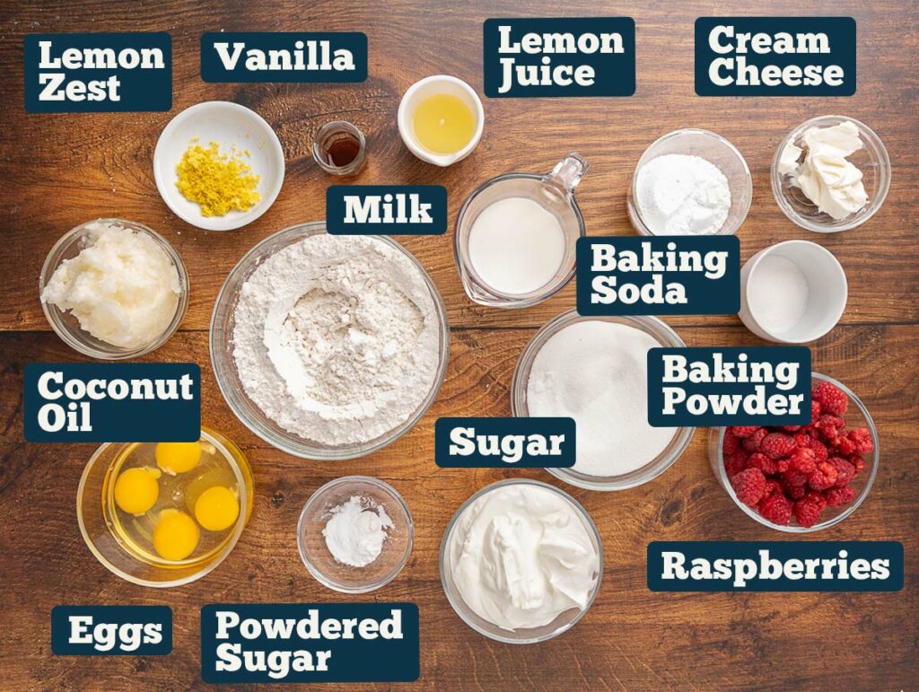 Raspberry cream cheese muffin ingredients: flour, sugar, baking soda, baking powder, coconut oil, lemon juice, lemon zest, vanilla, and raspberries.