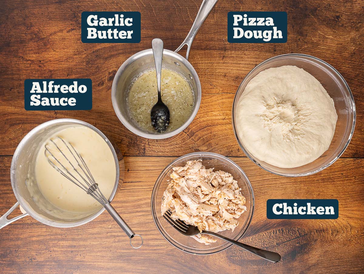 Chicken Alfredo pizza ingredients: Dough, Chicken, Garlic Butter, and Alfredo Sauce.