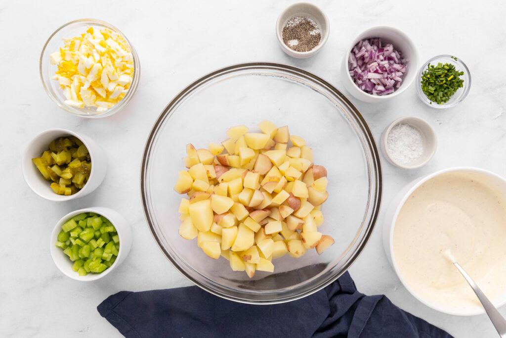 Ingredients for creamy potato salad measured and ready to mix together.