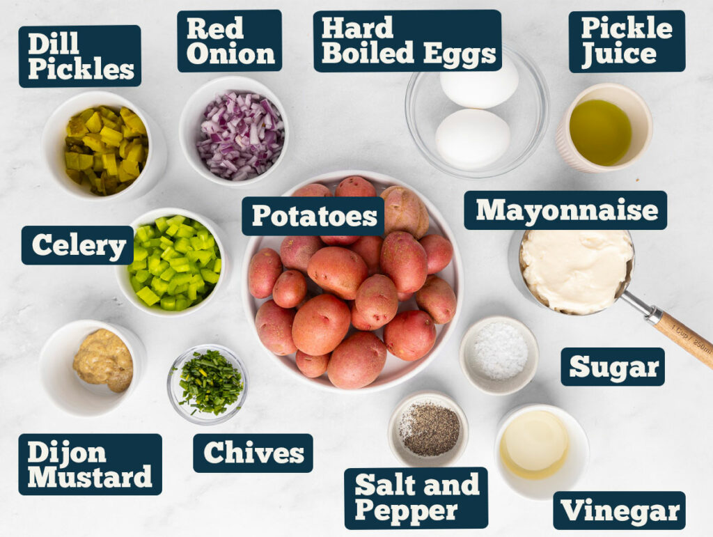 Creamy potato salad Ingredients: red potatoes, onion, celery, pickles, hard boiled eggs, mayonnaise, mustard, sugar, vinegar, pickle juice, salt and pepper.