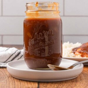 Homemade BBQ sauce in a Mason jar.