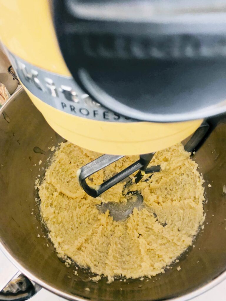 Shortcake batter being mixed in a stand mixer.