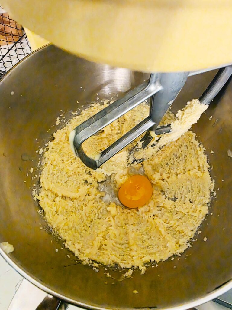 Shortcake batter being mixed in a stand mixer.
