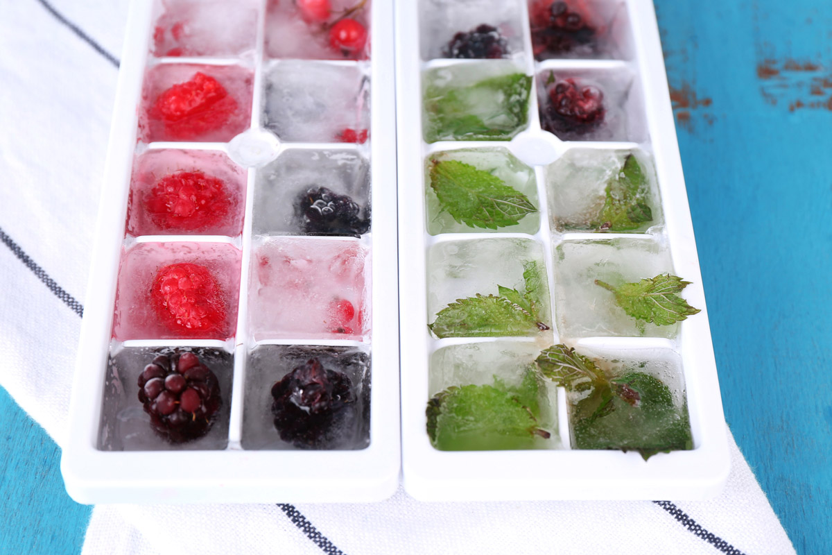 Ice cubes with mint and berries.