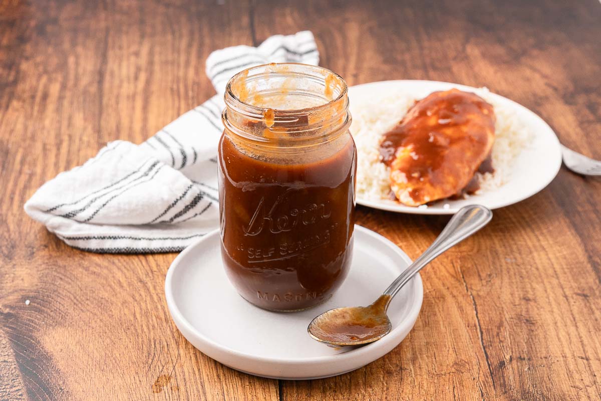Homemade BBQ sauce in a Mason jar.