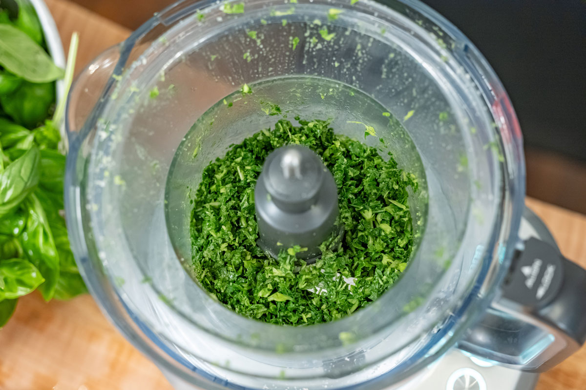 Basil salt blended in a food processor.