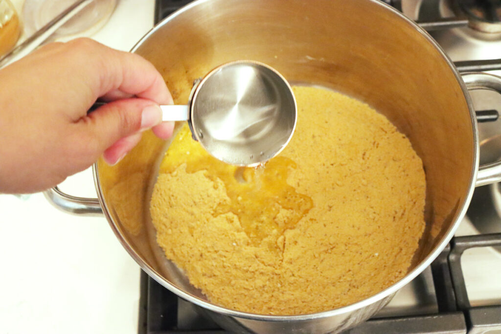 Water being added to mustard pickle brine.