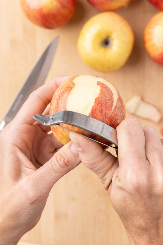 An apple being peeled.