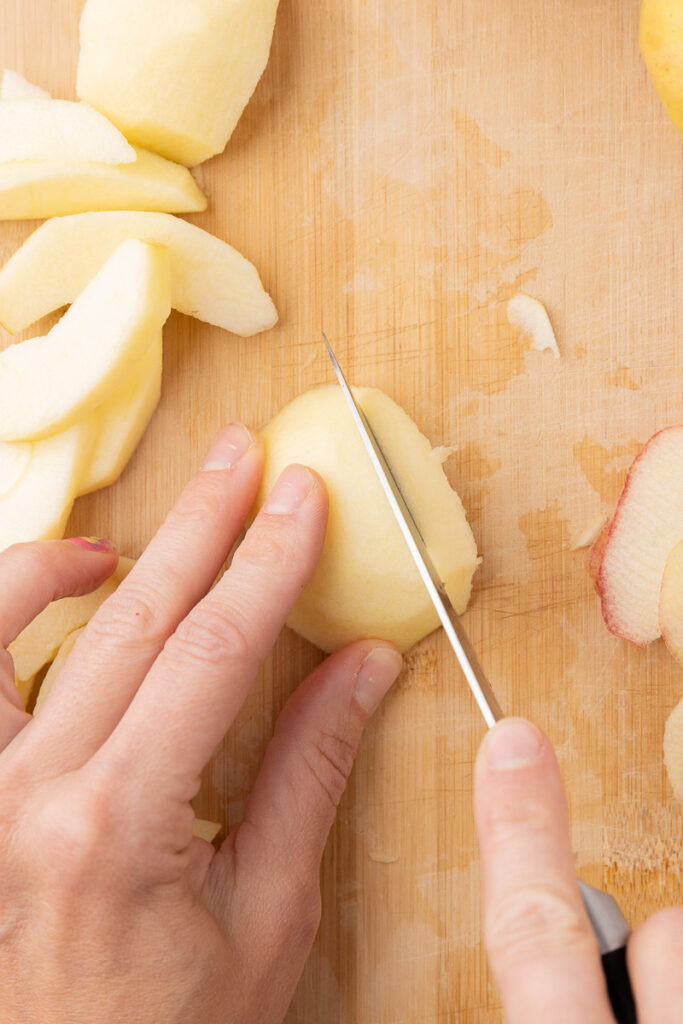 Apples being sliced and cored.