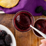 Blackberry jam on a spoon.